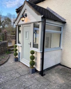 composite door installation with flood protection barrier